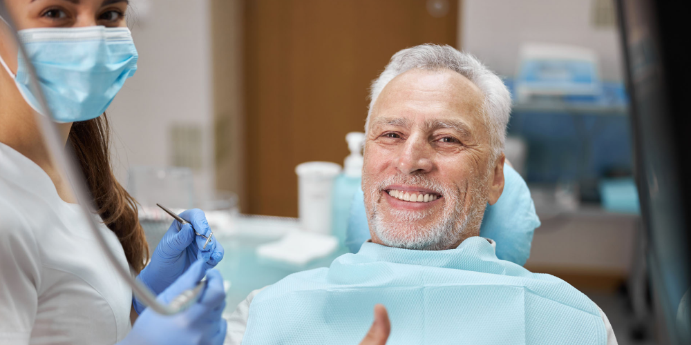 Man Smiling Becasue Russellville Dental Lab is awesome